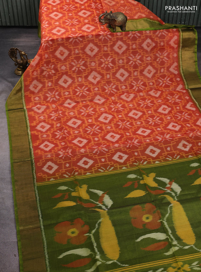 Ikat silk cotton saree orange and light green with allover ikat weaves and zari woven border
