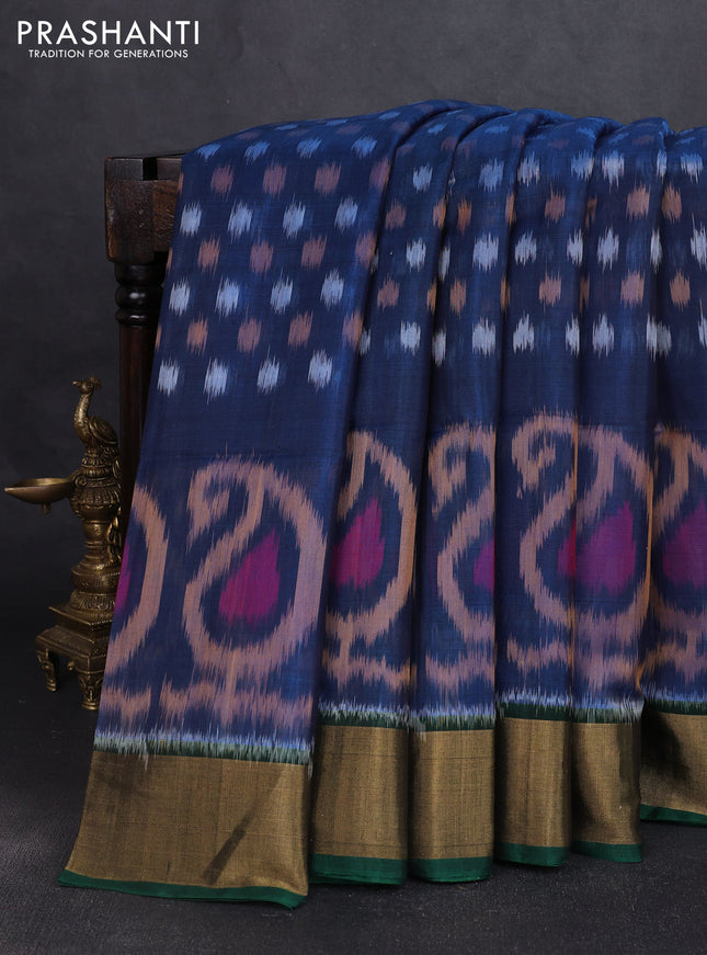 Ikat silk cotton saree blue and bottle green with allover ikat butta weaves and zari woven border