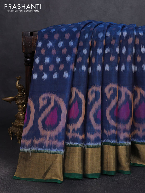Ikat silk cotton saree blue and bottle green with allover ikat butta weaves and zari woven border