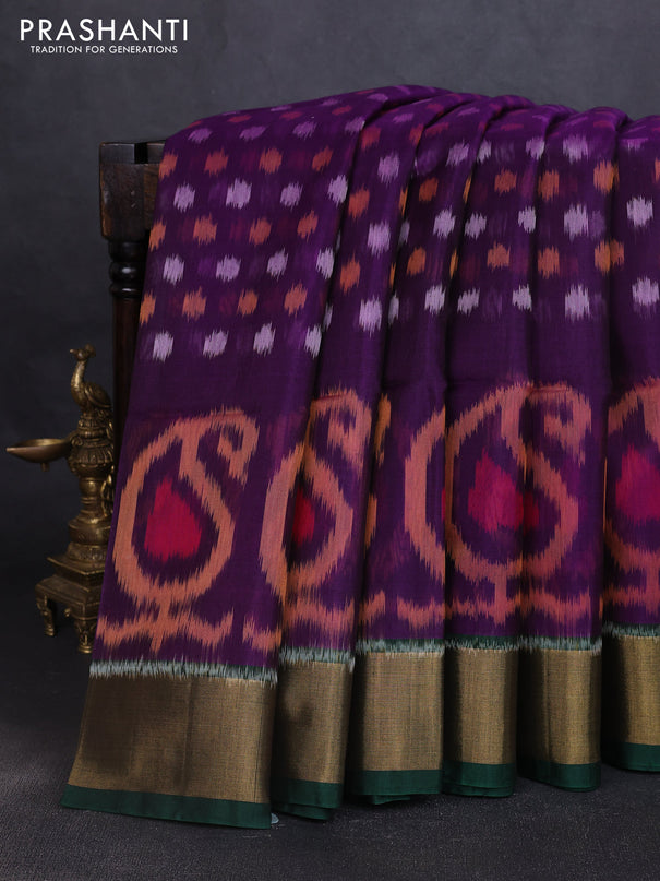 Ikat silk cotton saree purple and bottle green with allover ikat weaves and zari woven border