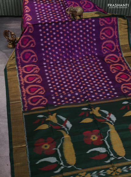 Ikat silk cotton saree purple and bottle green with allover ikat weaves and zari woven border
