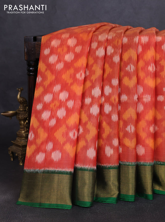 Ikat silk cotton saree orange and green with allover ikat weaves and zari woven border