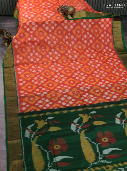 Ikat silk cotton saree orange and green with allover ikat weaves and zari woven border