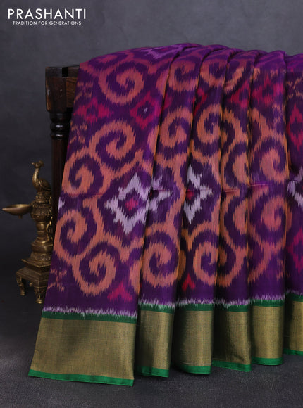 Ikat silk cotton saree violet and green with allover ikat weaves and zari woven border
