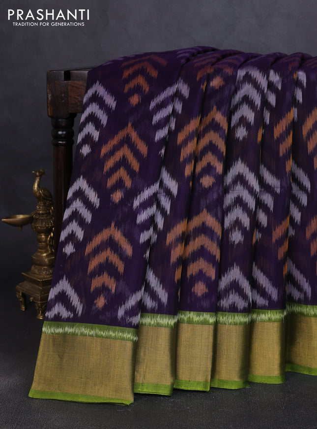 Ikat silk cotton saree navy blue and light green with allover ikat butta weaves and zari woven border
