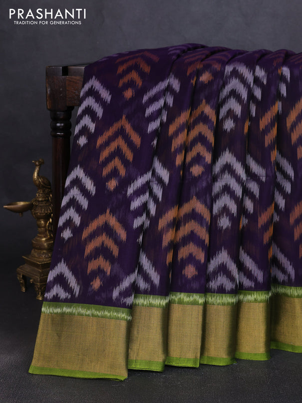 Ikat silk cotton saree navy blue and light green with allover ikat butta weaves and zari woven border