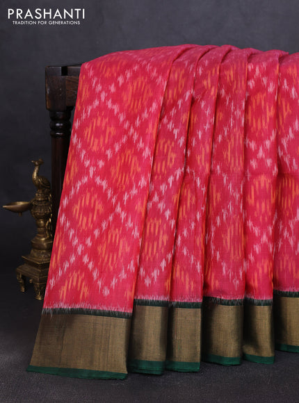 Ikat silk cotton saree pink shade and bottle green with allover ikat weaves and zari woven border