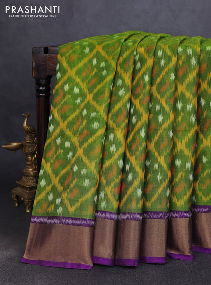 Ikat silk cotton saree mehendi green and purple with allover ikat weaves and zari woven border
