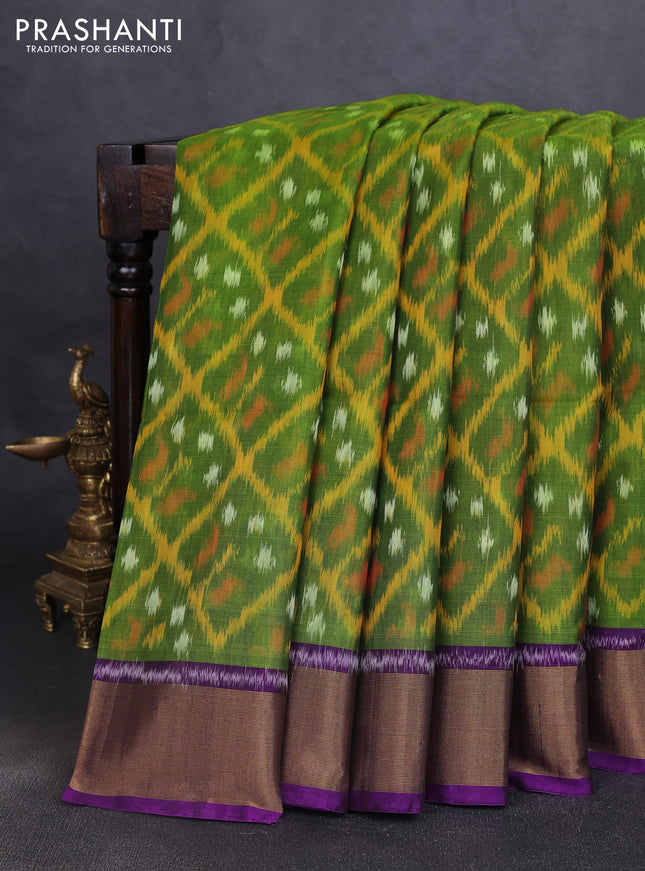 Ikat silk cotton saree mehendi green and purple with allover ikat weaves and zari woven border