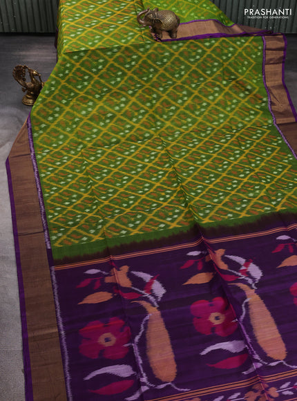 Ikat silk cotton saree mehendi green and purple with allover ikat weaves and zari woven border