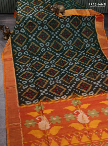 Ikat silk cotton saree bottle green and dark mustard with allover ikat weaves and zari woven border