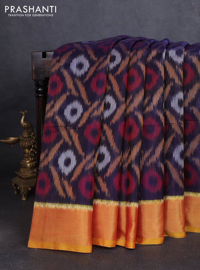 Ikat silk cotton saree navy blue and dark mustard with allover ikat weaves and zari woven border