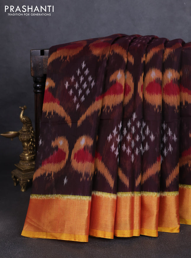 Ikat silk cotton saree coffee brown and dual shade of dark mustard with allover ikat weaves and zari woven border