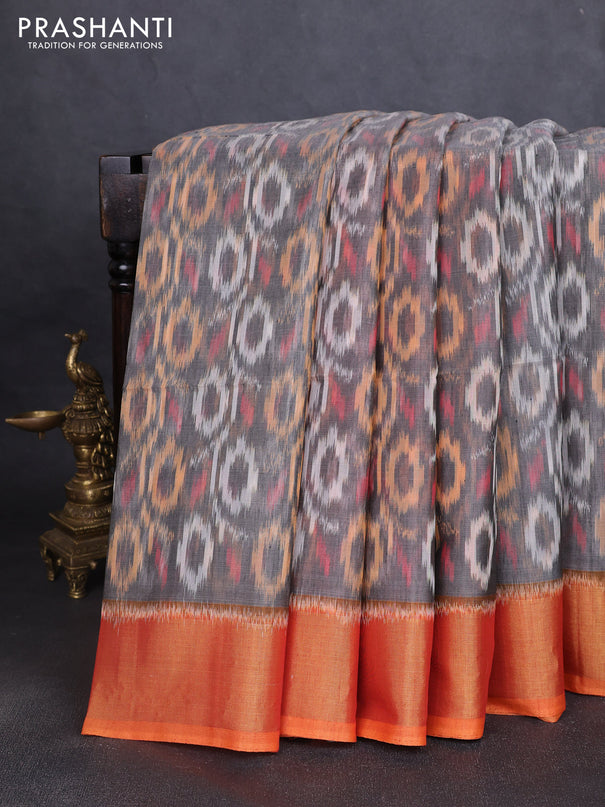 Ikat silk cotton saree grey and dual shade of orange with allover ikat weaves and zari woven border