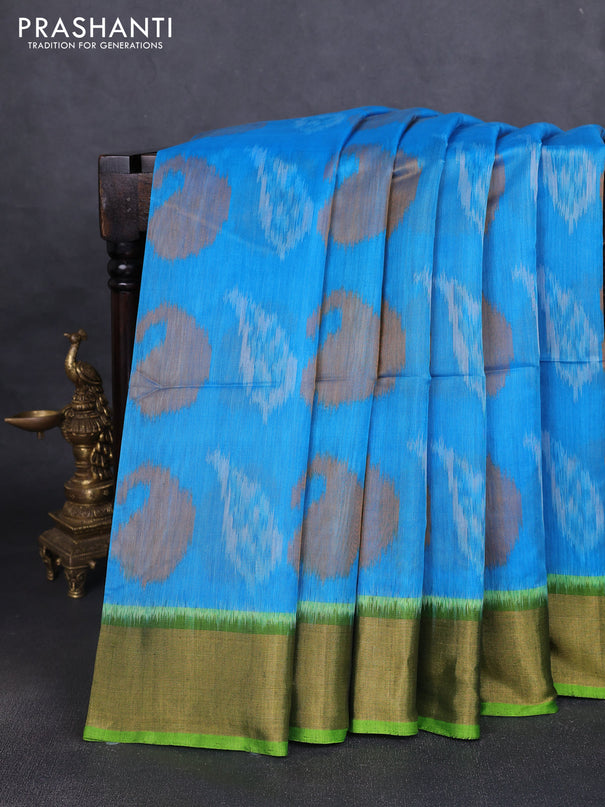 Ikat silk cotton saree blue and parrot green with allover ikat butta weaves and zari woven border