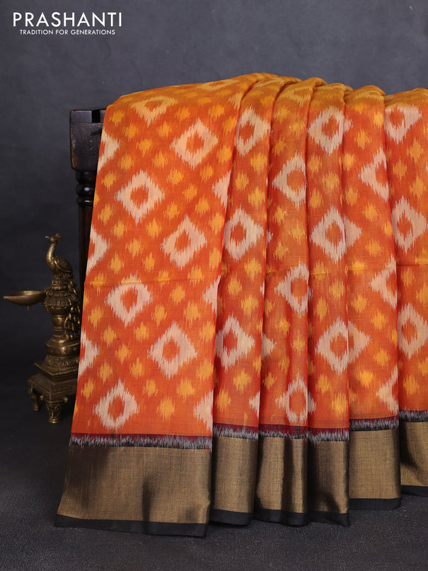 Ikat silk cotton saree rust shade and black with allover ikat weaves and zari woven border