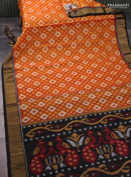 Ikat silk cotton saree rust shade and black with allover ikat weaves and zari woven border