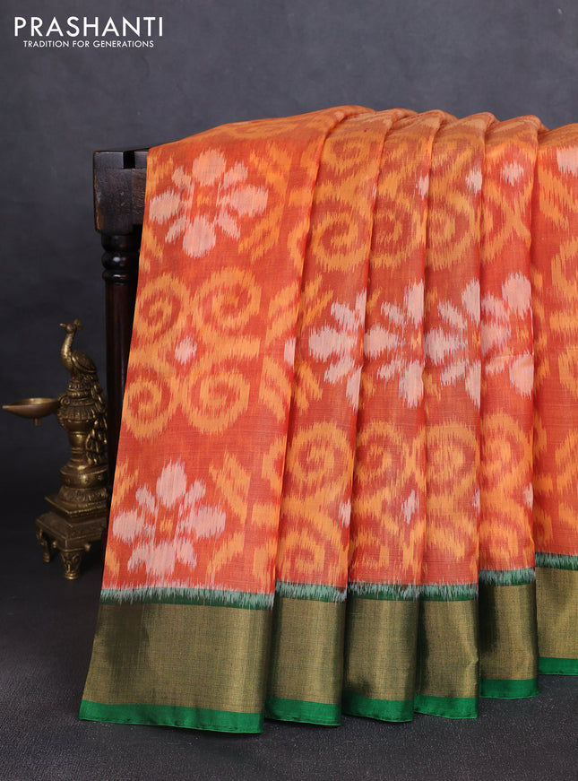 Ikat silk cotton saree rustic orange and green with allover ikat weaves and zari woven border