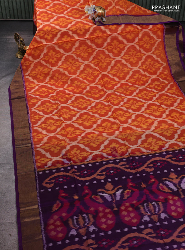 Ikat silk cotton saree rust shade and purple with allover ikat weaves and zari woven border