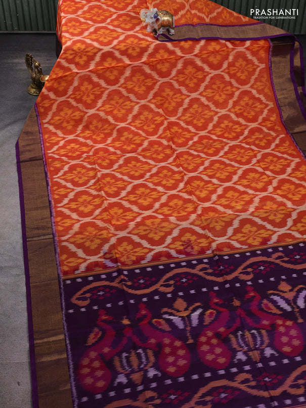 Ikat silk cotton saree rust shade and purple with allover ikat weaves and zari woven border