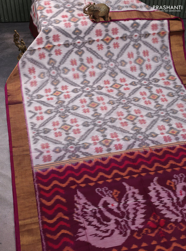 Ikat silk cotton saree off white and wine shade with allover ikat weaves and zari woven border