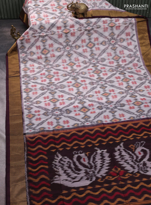 Ikat silk cotton saree off white grey and deep coffee brown with allover ikat weaves and zari woven border