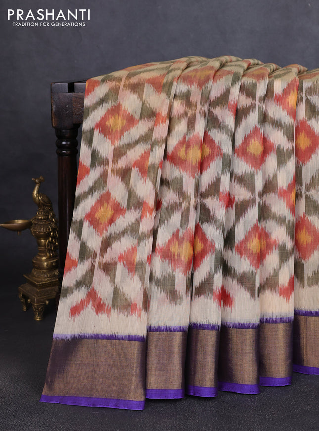 Ikat silk cotton saree cream and blue with allover ikat weaves and zari woven border