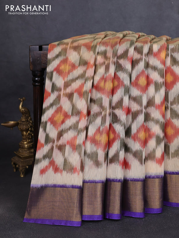 Ikat silk cotton saree cream and blue with allover ikat weaves and zari woven border