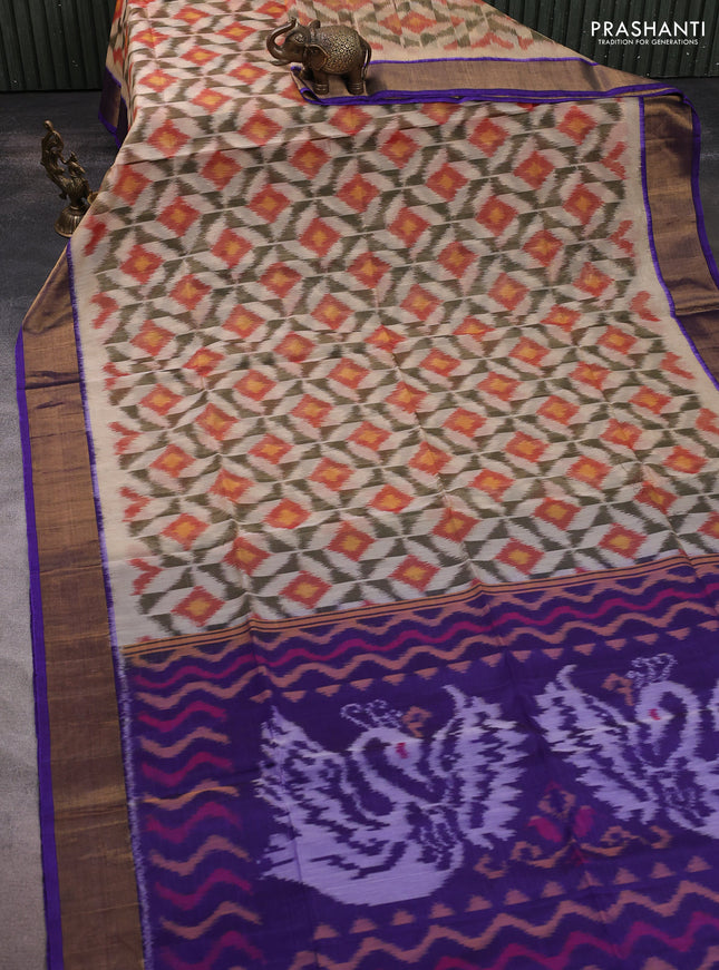 Ikat silk cotton saree cream and blue with allover ikat weaves and zari woven border
