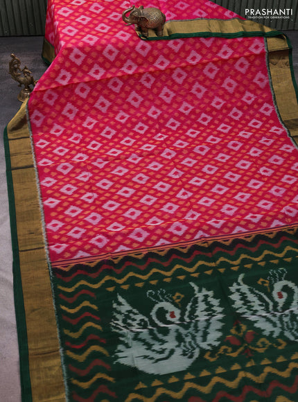 Ikat silk cotton saree pink and bottle green with allover ikat weaves and zari woven border