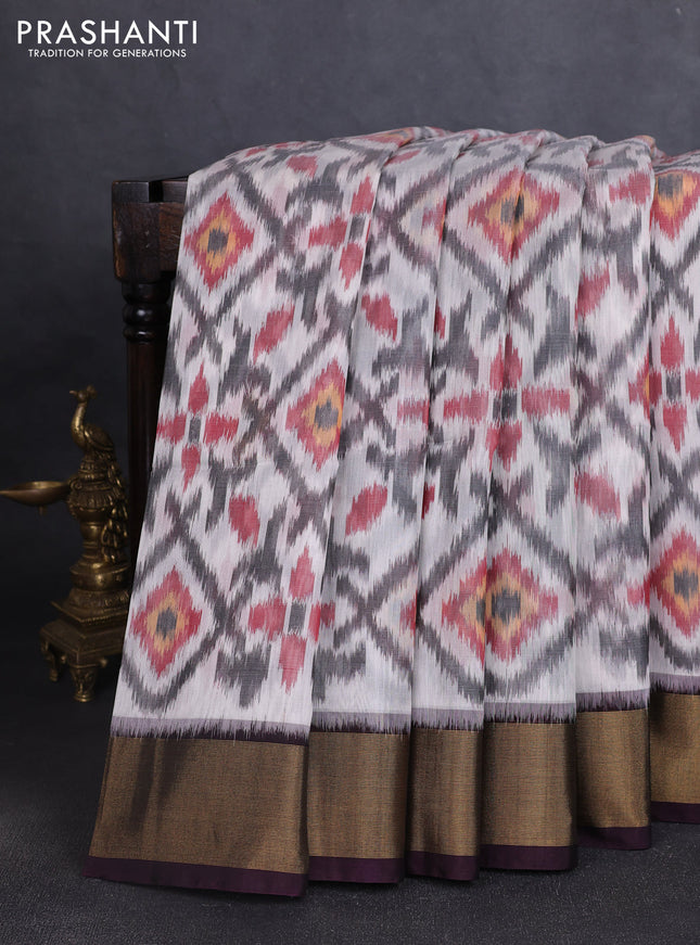 Ikat silk cotton saree off white and wine shade with allover ikat weaves and zari woven border