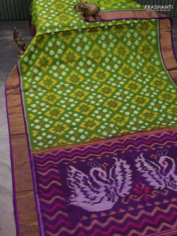 Ikat silk cotton saree mehendi green and purple with allover ikat weaves and zari woven border