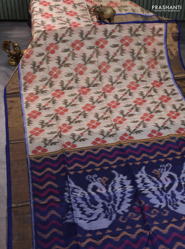 Ikat silk cotton saree sandal and peacock blue with allover ikat weaves and zari woven border