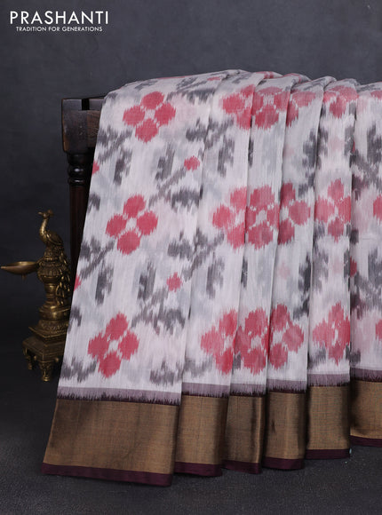 Ikat silk cotton saree off white and coffee brown with allover ikat butta weaves and zari woven border