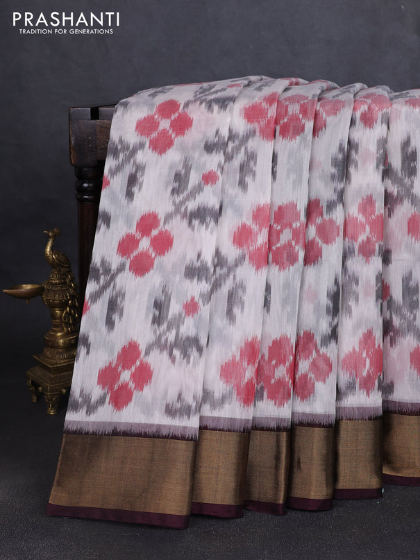 Ikat silk cotton saree off white and coffee brown with allover ikat butta weaves and zari woven border