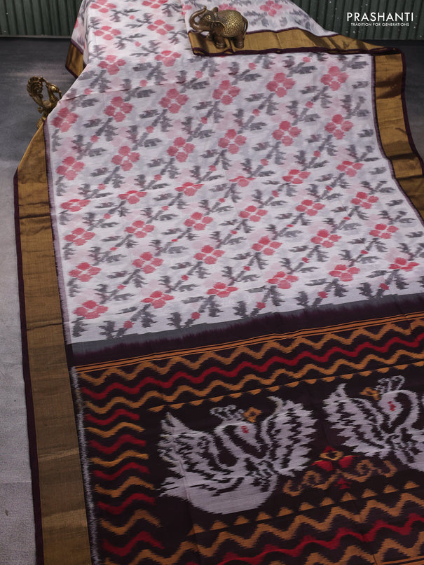 Ikat silk cotton saree off white and coffee brown with allover ikat butta weaves and zari woven border
