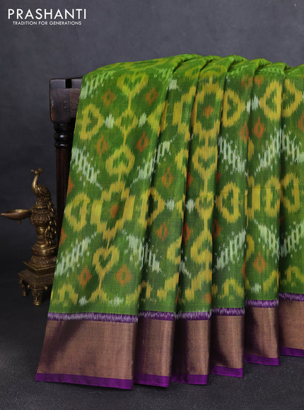 Ikat silk cotton saree green and purple with allover ikat weaves and zari woven border