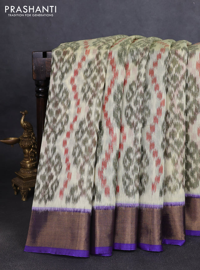 Ikat silk cotton saree cream and blue with allover ikat weaves and zari woven border