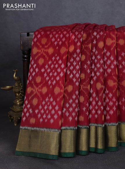 Ikat silk cotton saree red and bottle green with allover ikat weaves and zari woven border