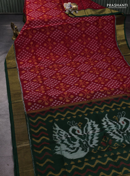 Ikat silk cotton saree red and bottle green with allover ikat weaves and zari woven border