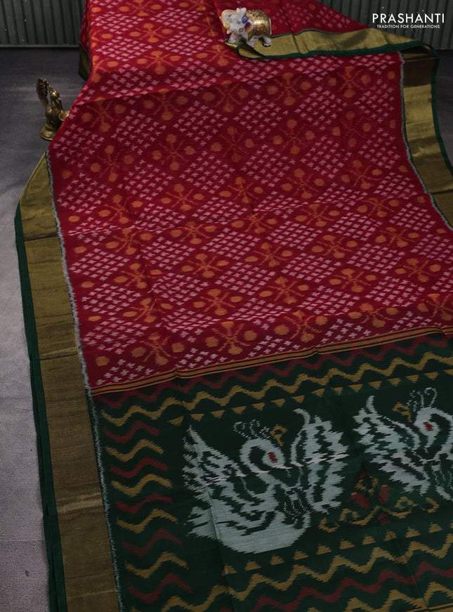 Ikat silk cotton saree red and bottle green with allover ikat weaves and zari woven border