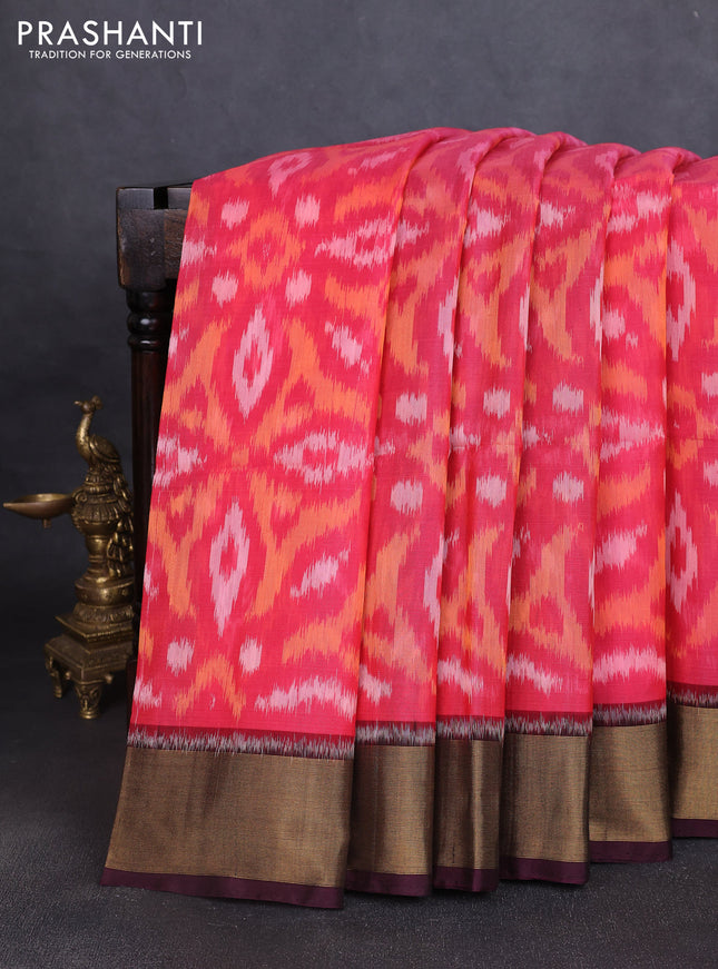 Ikat silk cotton saree peach pink and deep wine with allover ikat weaves and zari woven border