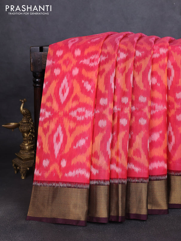 Ikat silk cotton saree peach pink and deep wine with allover ikat weaves and zari woven border