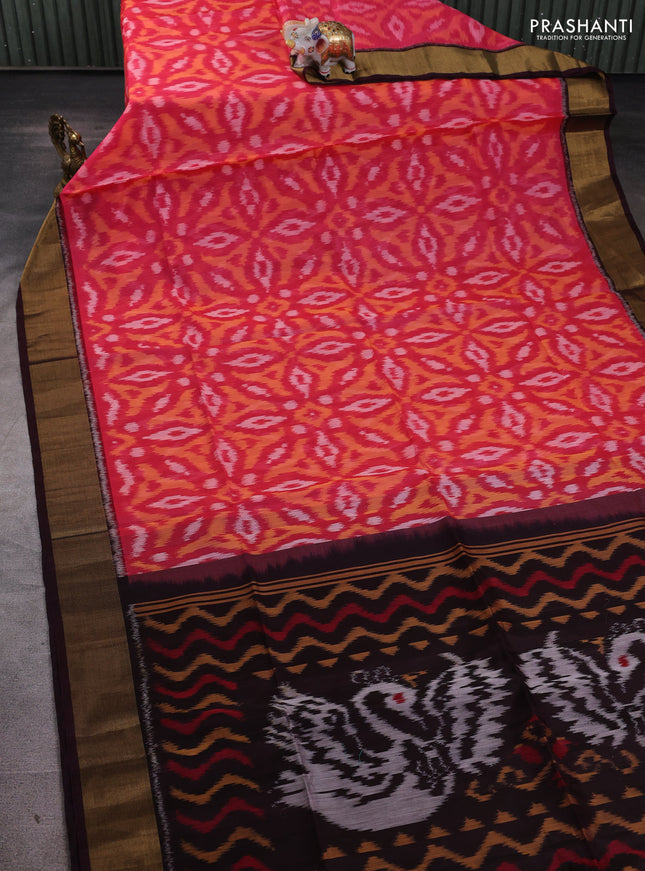 Ikat silk cotton saree peach pink and deep wine with allover ikat weaves and zari woven border