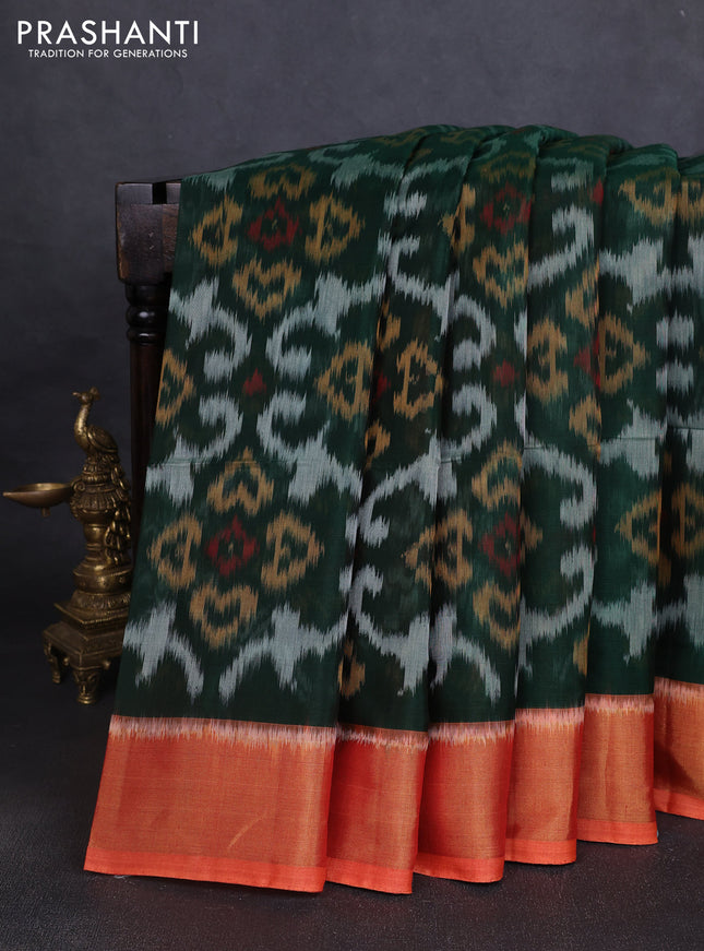 Ikat silk cotton saree bottle green and orange with allover ikat weaves and zari woven border