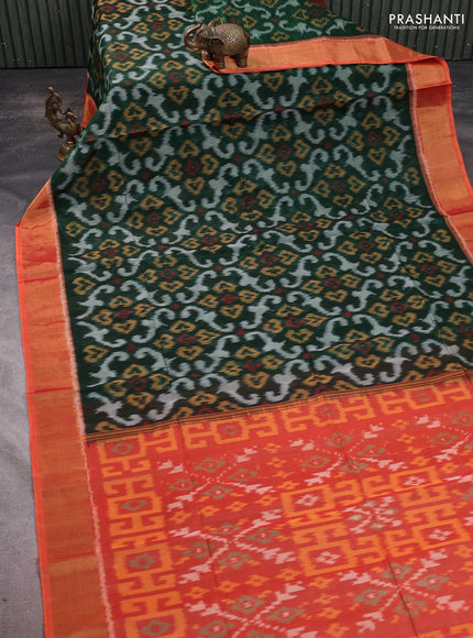 Ikat silk cotton saree bottle green and orange with allover ikat weaves and zari woven border