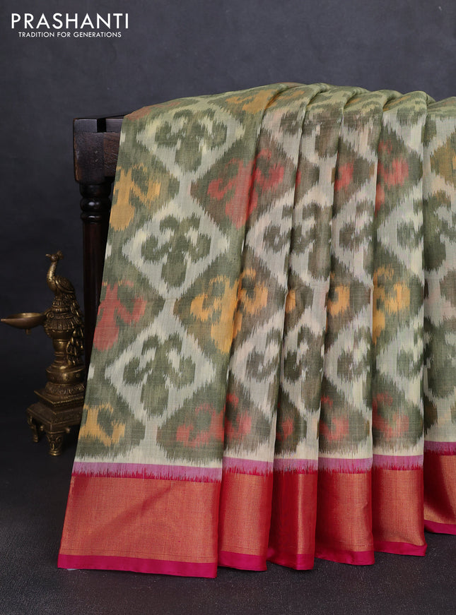 Ikat silk cotton saree mehendi green and pink with allover ikat weaves and zari woven border