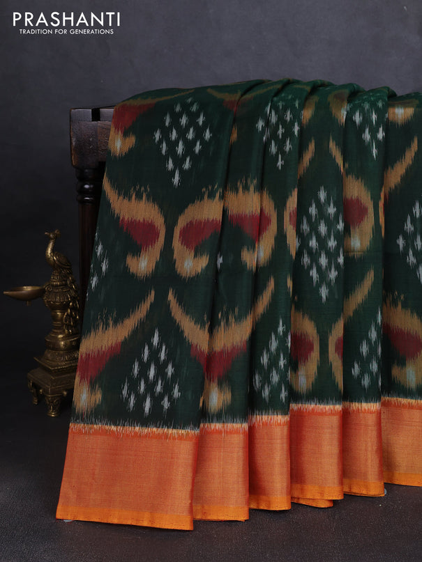 Ikat silk cotton saree bottle green and mustard yellow with allover ikat weaves and zari woven border