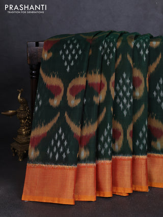 Ikat silk cotton saree bottle green and mustard yellow with allover ikat weaves and zari woven border