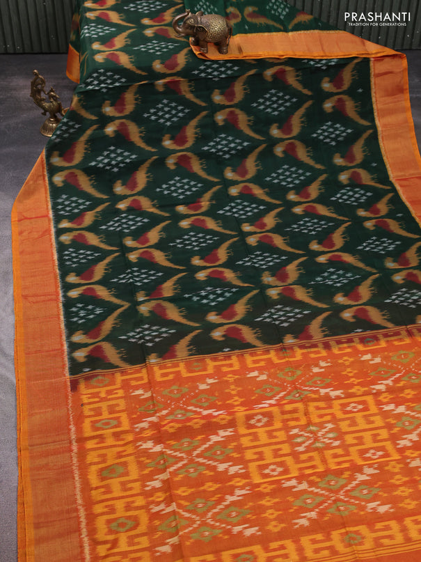 Ikat silk cotton saree bottle green and mustard yellow with allover ikat weaves and zari woven border